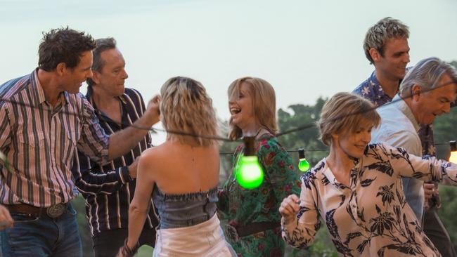 Aaron Jeffery, Richard E Grant, Claire van der Boom, Heather Mitchell, Sam Neill and Charlie Vickers in Palm Beach. Picture: Universal Pictures.