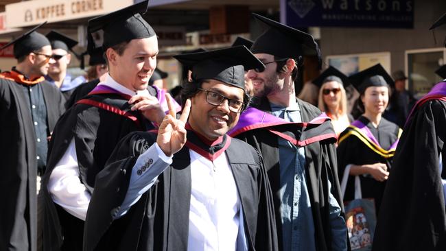 UTAS graduates taking part in the Town and Gown ceremony in Launceston. Picture: Justin Lemmon.