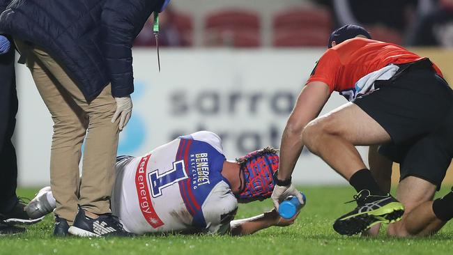 Newcastle's Kalyn Ponga down with concussion on the weekend. Picture: Brett Costello