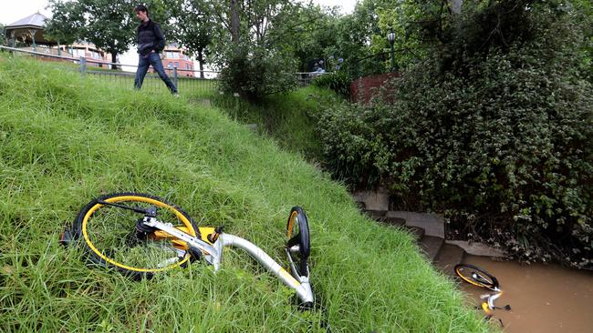 Discarded oBikes along the Yarra River. Picture: David Geraghty/The Australian