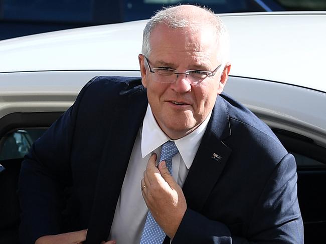 Australian Prime Minister Scott Morrison arrives for a visit to Central Coast Motor Group in Gosford, Tuesday, April 9, 2019. (AAP Image/Joel Carrett) NO ARCHIVING