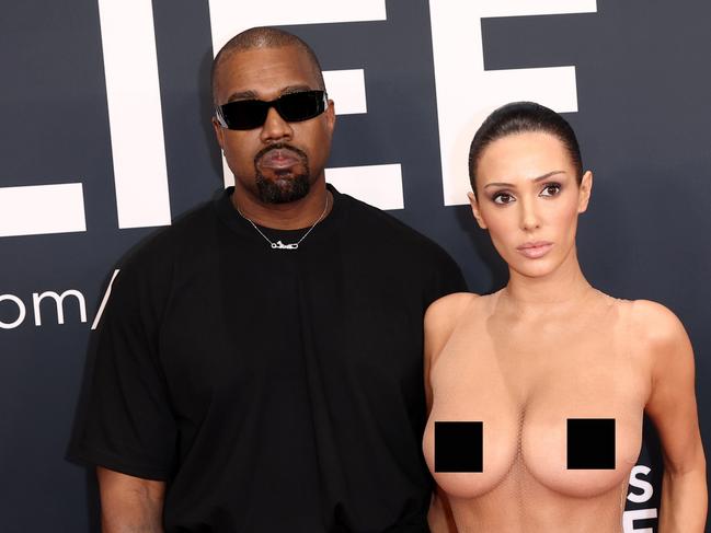 LOS ANGELES, CALIFORNIA - FEBRUARY 02: (EDITOR'S NOTE: Image contains nudity.) L-R, Kanye West and Bianca Censori attend the 67th Annual GRAMMY Awards on February 02, 2025 in Los Angeles, California.  (Photo by Matt Winkelmeyer/Getty Images for The Recording Academy)