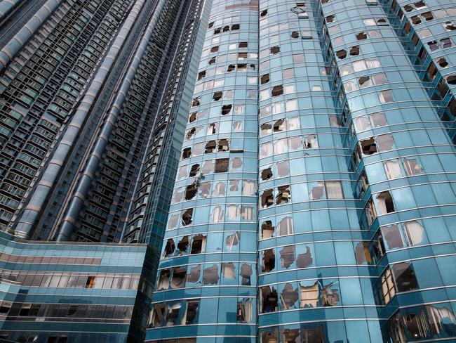 A general view shows a harbourside commercial building whose windows were blown out the day before during Typhoon Mangkhut in Hong Kong. Picture: AFP