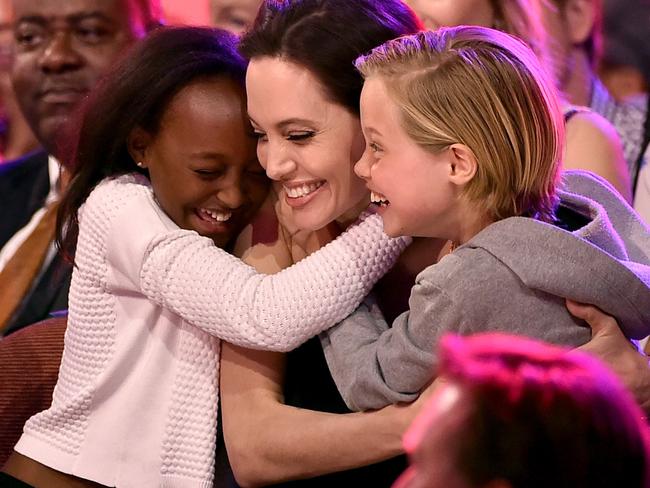 Angelina Jolie with her children Zahara Marley Jolie-Pitt (L) and Shiloh Nouvel Jolie-Pitt (R) in 2015. Picture: Kevin Winter/Getty Images