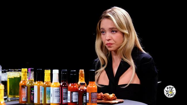 Sydney Sweeney was a guest Hot Ones, a YouTube show that asks celebrity guests questions while they eat rounds of spicy chicken wings. Picture: Hot Ones/YouTube