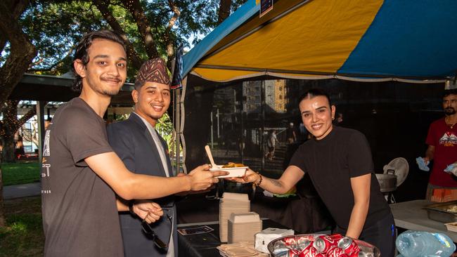 Prashant Kandel, Dhiraj Basnat with Asmita Rimal from urban spice pantry at the 2024 Darwin Nepalese Festival. Picture: Pema Tamang Pakhrin