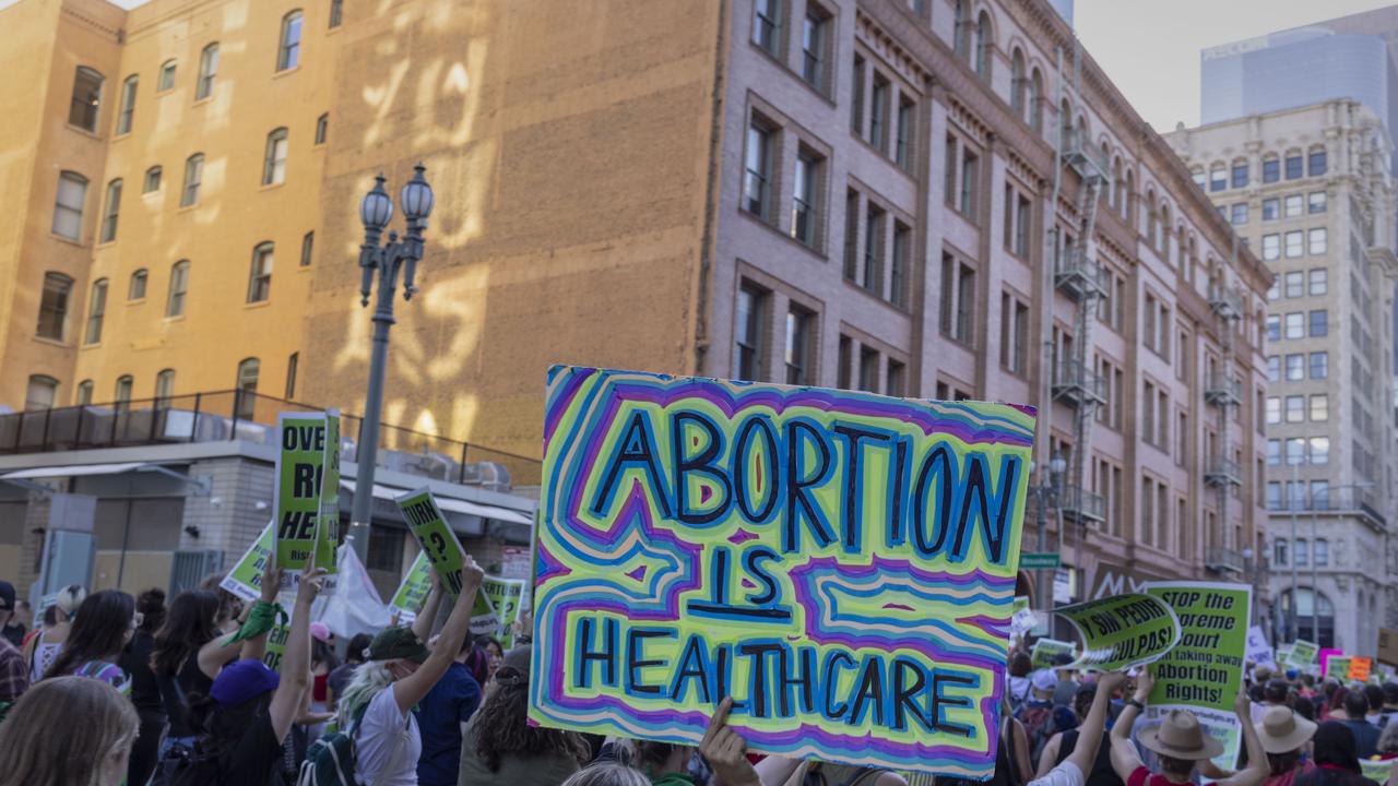 Protesters gather in reaction to the announcement in Los Angeles, California. Picture: Getty