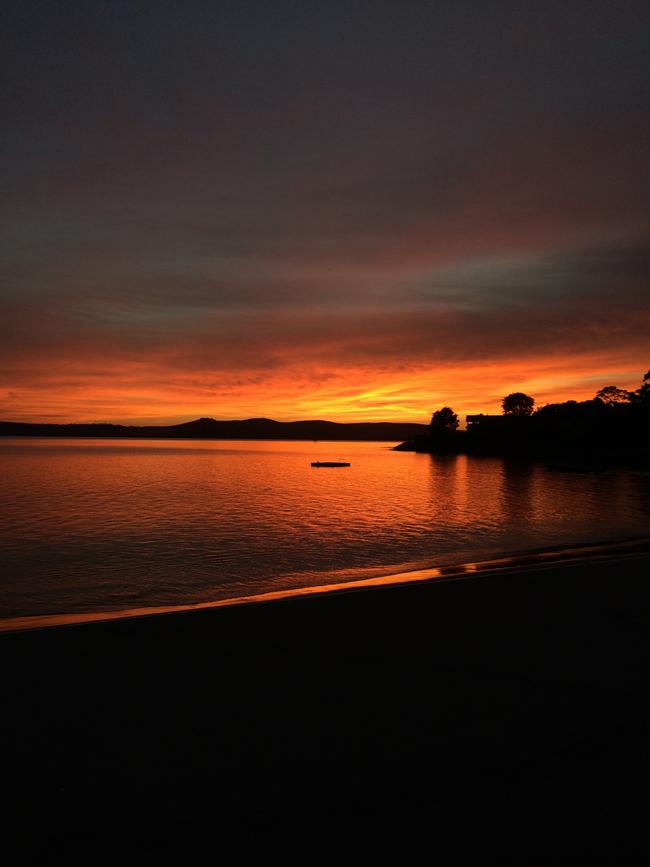 Sunrise in Sandy Bay at Long Beach. Picture: Justine Voss. Your Focus on Tasmania **ONE TIME USE ONLY**