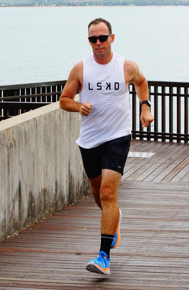 Townsville man CJ Flood training for his mammoth running attempt.