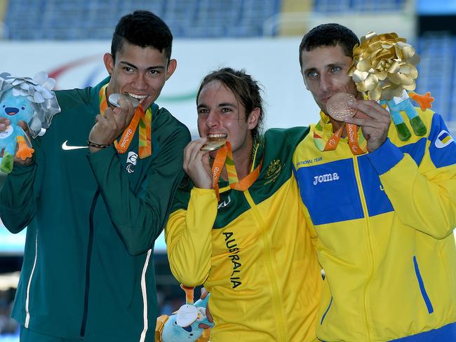 Brayden Davidson is the centre of attention after his long jump success.