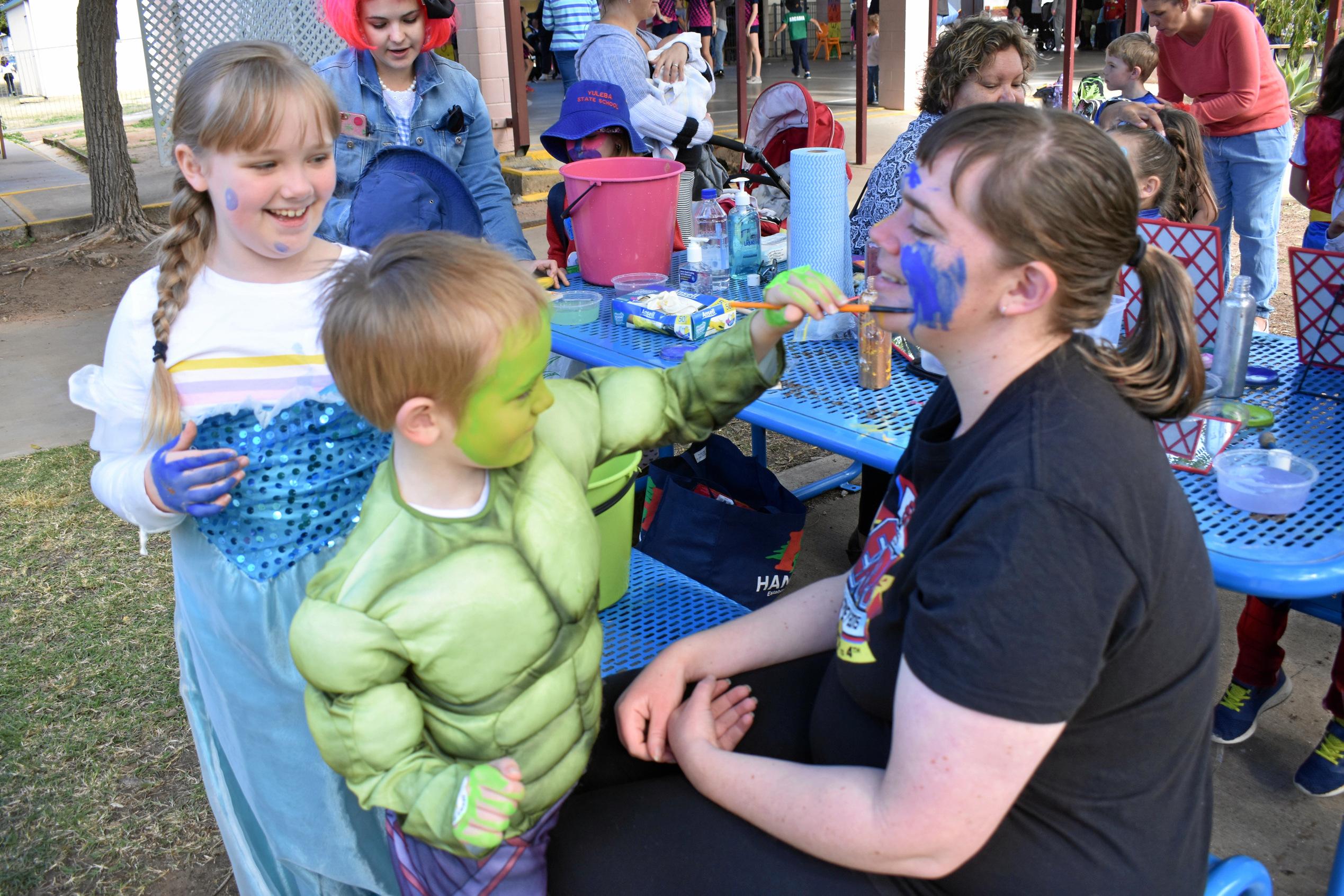 Portia and Blaise Frost paint mum Jade Murray's face. Picture: Jorja McDonnell