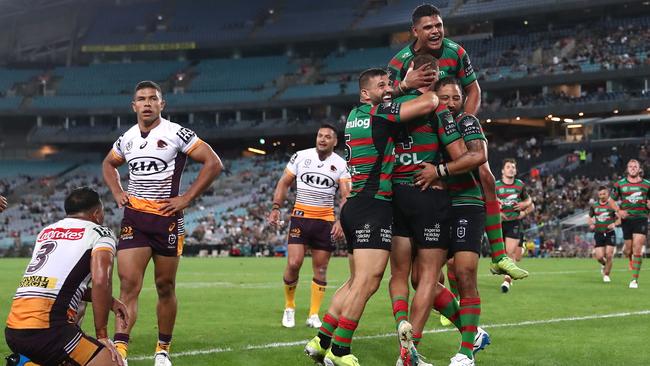 SYDNEY, AUSTRALIA - APRIL 08: Campbell Graham of the Rabbitohs celebrates with team mates after scoring a try during the round five NRL match between the South Sydney Rabbitohs and the Brisbane Broncos at Stadium Australia on April 08, 2021, in Sydney, Australia. (Photo by Mark Metcalfe/Getty Images)