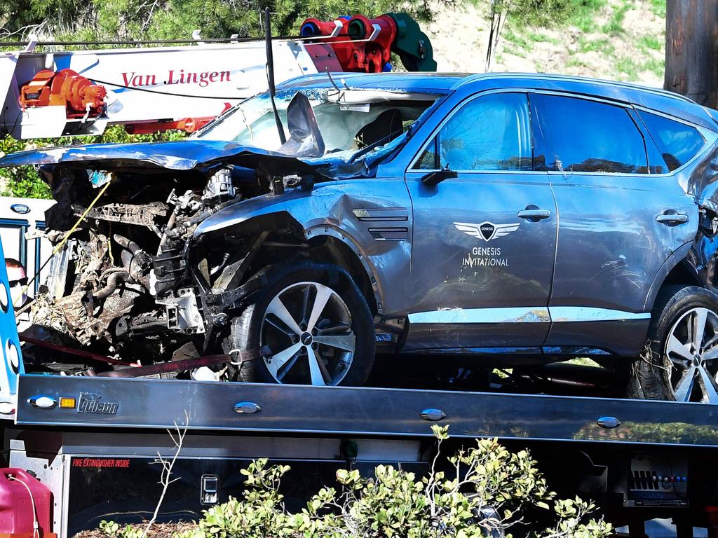 A tow truck recovers the vehicle driven by Tiger Woods.