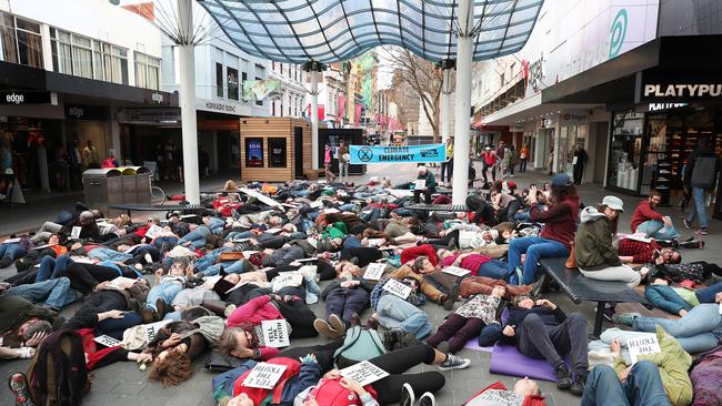 Climate change protesters Extinction Rebellion staging a mass 'die-in' in the Elizabeth Street Mall. Picture: NIKKI DAVIS-JONES