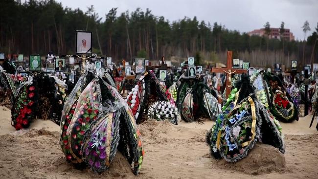 Reuters reporters saw at least three new rows of graves.