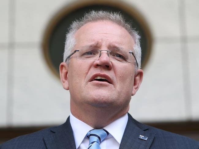 Prime Minister Scott Morrison is slashing the number of government departments from 18 to 14. Picture: Kym Smith