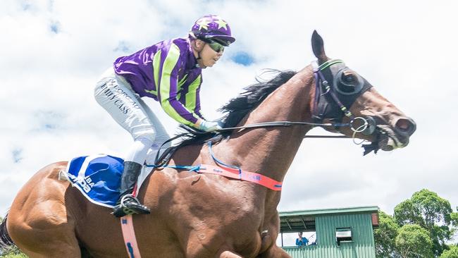 trainer Scott Cooper and jockey Emily Cass at Mareeba. Picture: Peter Roy.