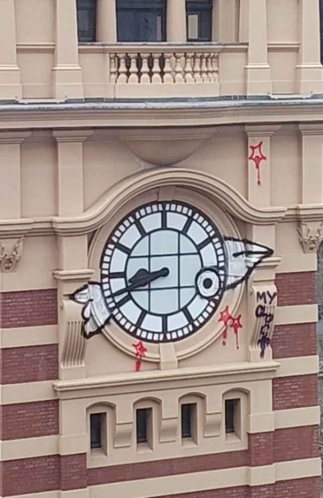 Pam the Bird graffiti on the iconic Flinders Street Station clock.