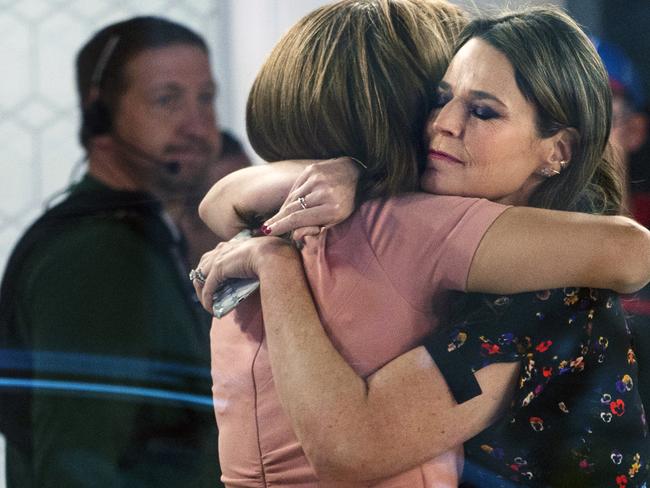 Hoda Kotb, left, and Savannah Guthrie embrace on the set of the Today show after Matt Lauer’s firing. Picture: AP/Craig Ruttle