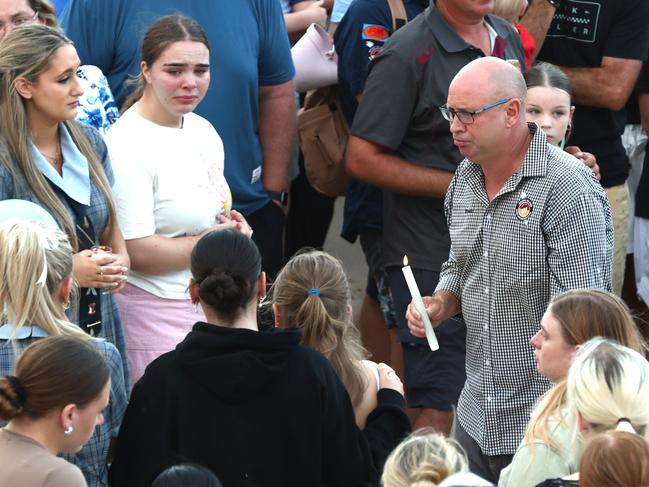 Hundreds gather for vigil to ‘shining light’ killed in Bribie shark attack