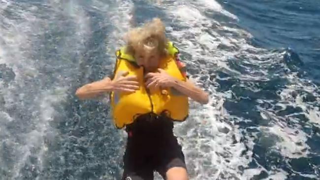 Julie Bishop jumps off the back of Wild Oats X during the Sydney Hobart. Picture: Craig Greenhill