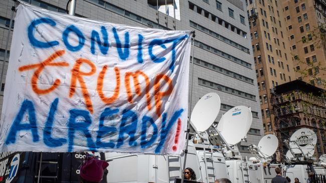 Anti-Trump activists confront Trump supporters on the first day of his hush money trial. Picture: Getty Images