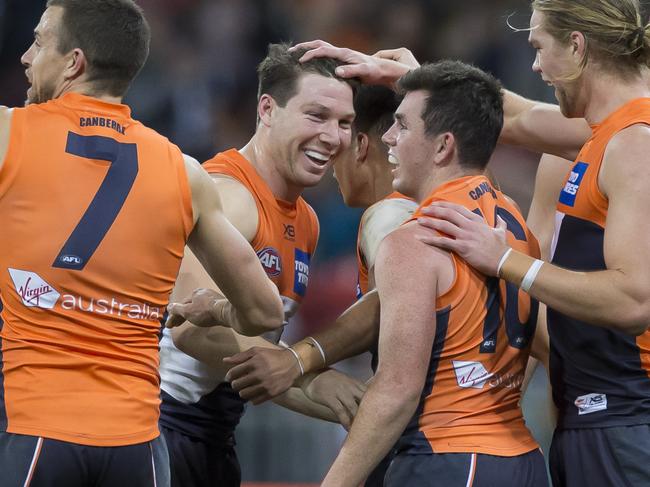 Toby Greene celebrates with Ian Hill of the Giants after kicking a goal during the Round 18 AFL match between the GSW Giants and the Collingwood Magpies at the Sydney Showground Stadium in Sydney, Saturday, July 20, 2019. (AAP Image/Craig Golding) NO ARCHIVING, EDITORIAL USE ONLY