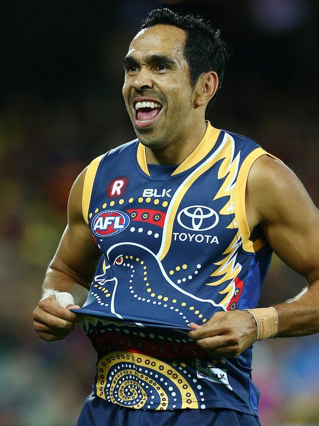 Eddie Betts proudly shows off his Indigenous Round jumper when playing with the Crows.