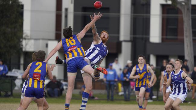 MPNFL: Somerville’s Tom Roberts and Matthew Naughton of Langwarrin battle in the ruck. Picture: Valeriu Campan