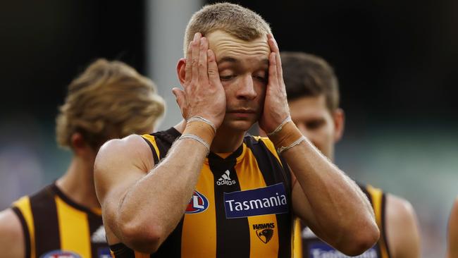 James Worpel walks off after Hawthorn’s sixth loss of the season.