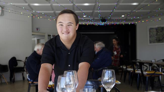 DoSomething Day 2017 volunteer Max Milson (19) working at the Gaden Community Cafe Sydney, Australia, Wednesday, July 19, 2017. Max helps in the kitchen and on the floor every Wednesday. (AAP Image/Jane Dempster)