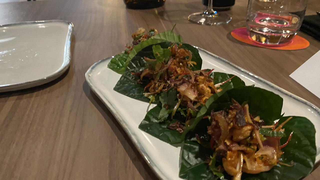 Smoked eel betel leaf with saw tooth coriander and peanuts. Picture: Grace McKinnon