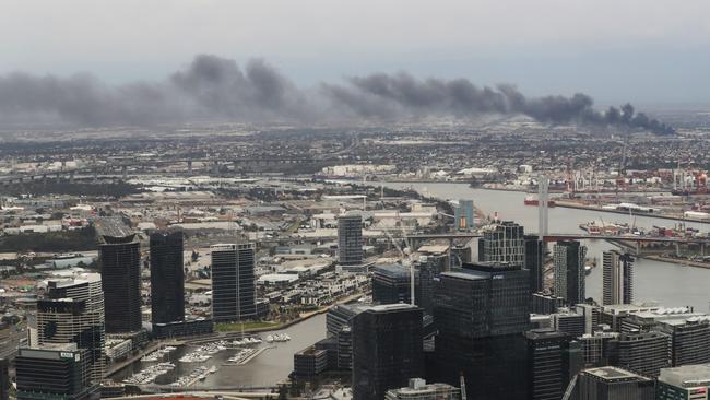 The smoke spread across the city. Picture: AAP Image/David Crosling