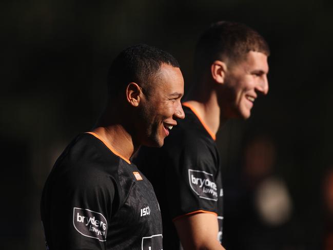 The Wests Tigers are yet to work out where (L-R) Moses Mbye and Adam Doueihi best fit in the team. Picture: Brett Costello