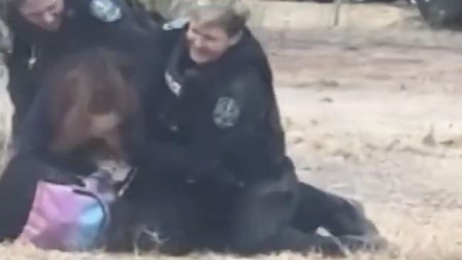 The moment of the violent arrest at Elizabeth North, during which three police officers were injured. Picture: 7NEWS