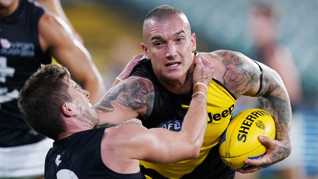 Dustin Martin fends off Marc Murphy when Richmond played Carlton in Round 1 this year. Picture: AAP