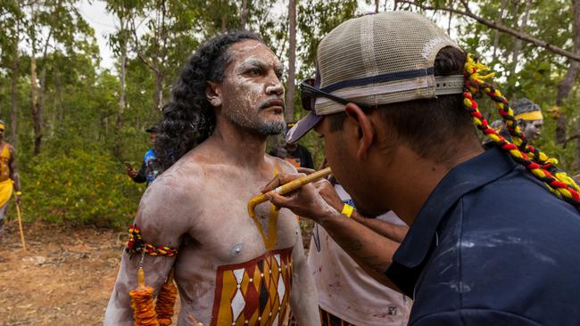 Yolngu man having body paint applied during the Garma Festival 2022 at Gulkula. Picture: Tamati Smith/Getty Images