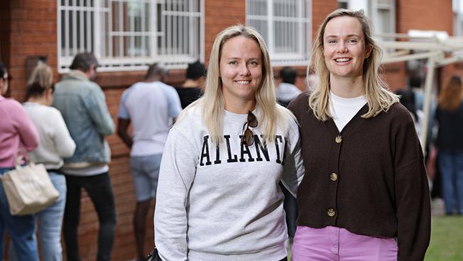 Prospective renters Alara Cassells and Amelia Corrigan at a packed rental inspection in Ashfield. Picture: Adam Yip