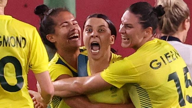 KASHIMA, JAPAN - JULY 30: Sam Kerr #2 of Team Australia celebrates with team mates after scoring their side's fourth goal during the Women's Quarter Final match between Great Britain and Australia on day seven of the Tokyo 2020 Olympic Games at Kashima Stadium on July 30, 2021 in Kashima, Ibaraki, Japan. (Photo by Atsushi Tomura/Getty Images)