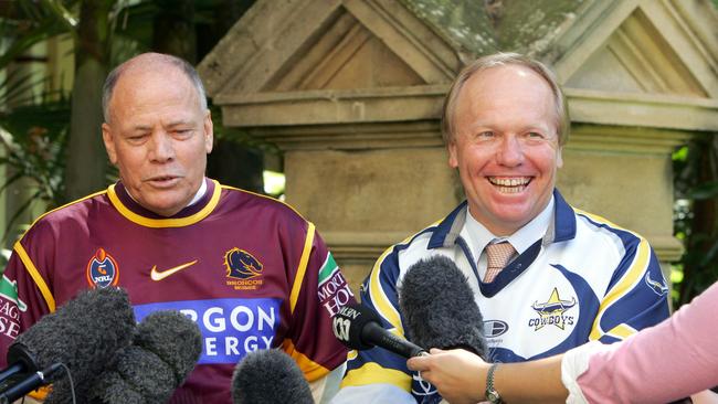 Premier Peter Beattie (right) and Deputy Terry Mackenroth wearing Broncos and North Queensland Cowboy outfits. Pic: Nathan Richter.