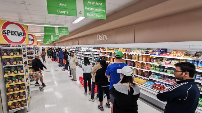 People queuing for a delivery of groceries at a Coles supermarket in Epping in Sydney’s northern districts in March. Picture: AAP