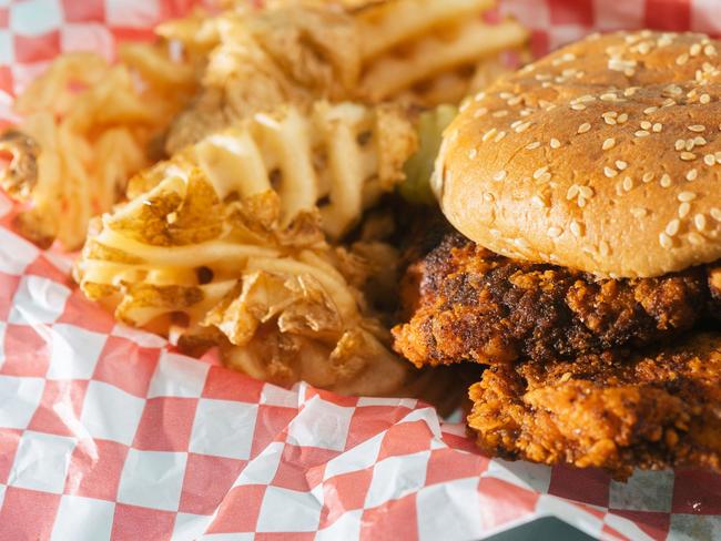 A fried-chicken sandwich with a side of waffle fries ANGELA OWENS/THE WALL STREET JOURNAL