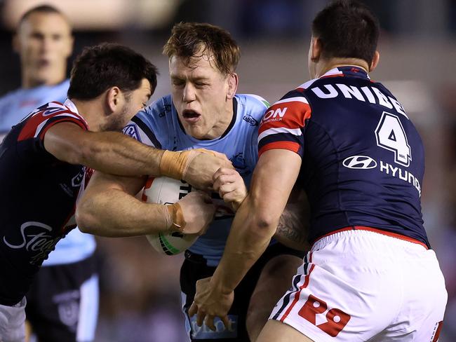 SYDNEY, AUSTRALIA - SEPTEMBER 09:  Cameron McInnes of the Sharks is tackled during the NRL Elimination Final match between Cronulla Sharks and Sydney Roosters at PointsBet Stadium on September 09, 2023 in Sydney, Australia. (Photo by Mark Metcalfe/Getty Images)