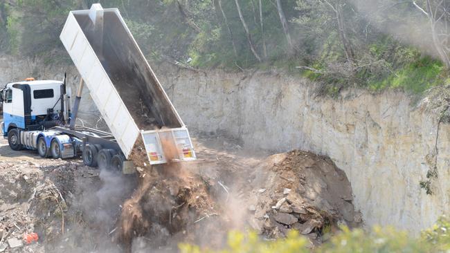 A truck illegally dumping material at Highbury. Photo supplied by the EPA.