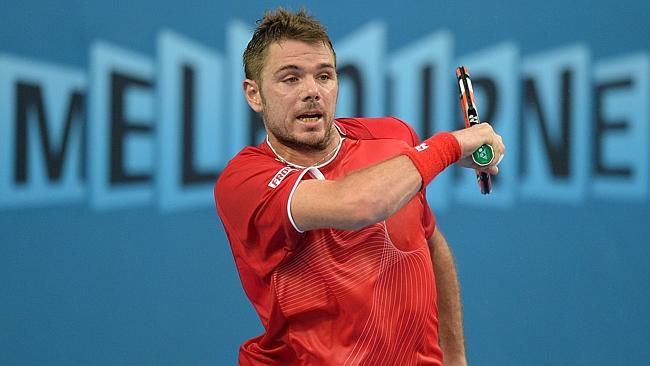 Switzerland's Stanislas Wawrinka plays a shot against Colombia's Alejandro Falla. Picture; AFP