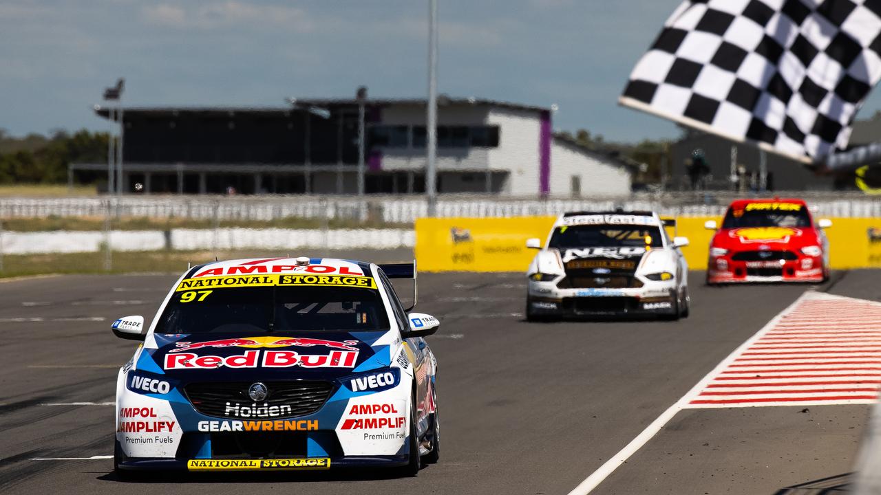 Shane van Gisbergen takes the chequered flag to win race 2 of the 2020 Supercars Championship round at The Bend.