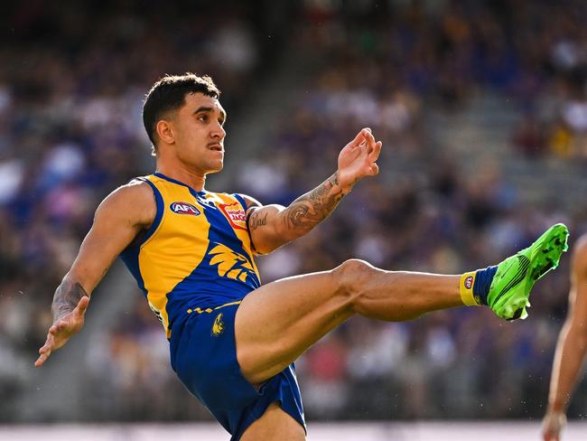 PERTH, AUSTRALIA - APRIL 14: Tyler Brockman of the Eagles kicks on goal during the 2024 AFL Round 05 match between the West Coast Eagles and the Richmond Tigers at Optus Stadium on April 14, 2024 in Perth, Australia. (Photo by Daniel Carson/AFL Photos via Getty Images)