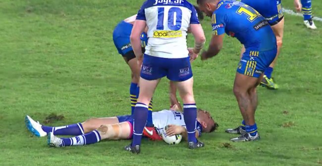Dive? Josh Reynolds appears to be knocked out after a hit.