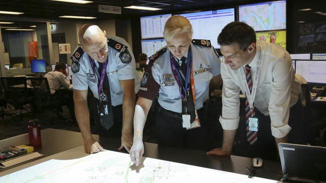 Acting Assistant Commissioner Paul Taylor, Assistant Police Commissioner Katarina Carroll and Cairns MP Gavin King in the police command centre during G20 in Brisbane.