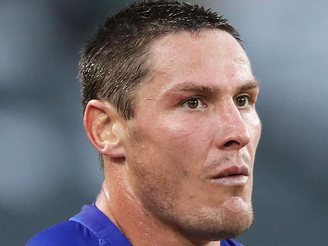 SYDNEY, AUSTRALIA - APRIL 19: Josh Jackson of the Bulldogs makes his point to referee Henry Perenara watches the replay on the big screen during the round 6 NRL match between the Canterbury-Bankstown Bulldogs and the South Sydney Rabbitohs at ANZ Stadium on April 19, 2019 in Sydney, Australia. (Photo by Mark Kolbe/Getty Images)